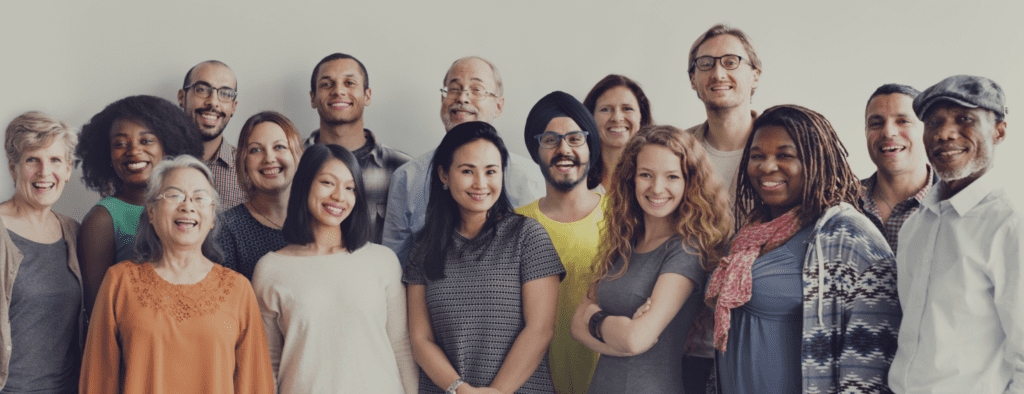 A group of people standing next to each other.